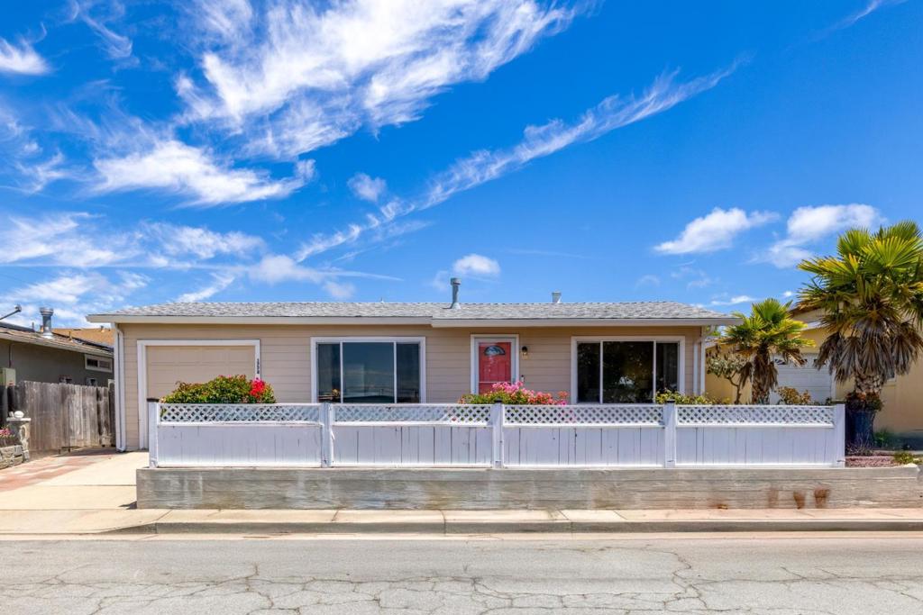 For anyone inspired to create a glorious life at the gateway to the Monterey Peninsula, this single-level home in the highly sought-after Del Monte Heights neighborhood of Seaside represents a dream realized. Dazzling bougainvillea marks your arrival as you pass through a freshly manicured garden space on your way inside. Here is a charming home just minutes from the ocean and mere blocks from shops, amenities, and some of the most popular restaurants in the area. Pull back the blinds on oversized windows to let the sun cast its energizing rays over lustrous hardwood flooring in your living room, which connects to a bright, open kitchen. Prepare a favorite lunch in the glow of afternoon light with the help of stainless-steel appliances, a gas range, and chic white cabinetry. Rich wood floors and sunshine continue in both bedrooms, each one beautifully simple and offering everything a person needs to feel happy and fulfilled each day. Out back, the fully fenced yard is ripe for the imagination. Already featuring a shed and a small paved patio, it waits for you to answer the question of what will come next. Mature, vibrant gardens? Custom hardscaping? An ADU? The choice, and the rare chance to create your own private sanctuary in a sublime coastal climate, is yours.