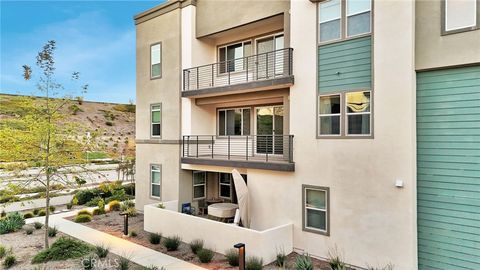 Photo of 26958 Sandbar Willow Pl Pl #205, Valencia, CA 91355 (MLS # SR26046621)