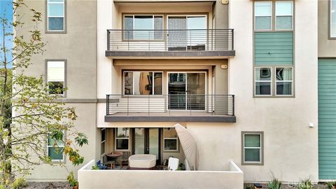 Photo of 26958 Sandbar Willow Pl Pl #205, Valencia, CA 91355 (MLS # SR26046621)