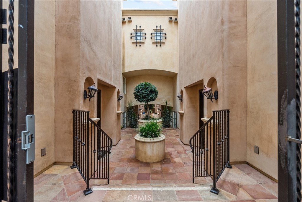 Key Features of This Home:
- Mediterranean Style Townhome in a Private Gated Community
- Entirely Remodeled with Luxury Finishes
- Private Patio
- Brand New Flooring
- Large Living Room with a Cozy Fireplace
- 2 Private Balconies
- Santa Monica School District ----
Experience the essence of refined coastal living in this fully remodeled 2-bedroom, 3-bath townhome with a bonus loft and home office. In a private gated community in the heart of Santa Monica, with no neighbors above or below and direct garage access, this home offers both comfort and privacy. Inside, new flooring runs throughout bright, open spaces. The kitchen has been fully upgraded with marble quartz countertops, custom cabinetry, a farmhouse sink, and high-end appliances, including a Viking stove. French doors open to a private patio, perfect for relaxing or entertaining. Upstairs, both bedrooms are en-suite retreats. The primary suite features a walk-in closet, private balcony, and a spa-like bathroom with a jacuzzi tub. A versatile loft adds extra space for an office or lounge. The complex includes a quiet private courtyard, while the home offers peace of mind with a brand-new HVAC system and water heater. HOA benefits include 24-hour security, earthquake insurance, trash service, and beautifully maintained grounds. With nearly 1,700 sq. ft. of living space and multiple outdoor areas, this home is a rare find—combining style, privacy, and convenience just minutes from beaches, shopping, and dining.