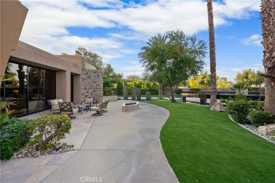 MONTHLY RATES STARTS AT $15,000 PER MONTH. SEASONAL RATES APPLY. PLEASE INQUIRE.



Dream Desert Vacation at Sprawling Contemporary Estate, GREAT VALUE

Summary:  AWARD WINNING  luxury home with sweeping mountain and golf course views

Enjoy incredible sunsets and sunrises from this dream vacation home — a one-of-a-kind work of art.

With sweeping views of 10,000 foot high snow covered mountains and a private golf course, this 9-bedroom, 7,800-square-foot luxury home juts up from the desert landscape as the crowning jewel of this multi-million-dollar neighborhood, Westgate.  Westgate is a gated neighborhood within a private country club, and has 0.5 to 1.5 acre estate homes on the golf course. Truly unique.

As an internationally award winning home for its architecture. Great for large family gatherings, business events, cultural events, golf outings, celebrations, and romantic getaways. The home features light-flooded living spaces, high end finishes, patios off every room in the home, a pool and spa with a swim-up pool bar, and lush bedroom suites. With TEN massive 10 foot high pocket sliding glass doors (disappearing walls of glass), this home redefines indoor/outdoor living at its finest, bring the surrounding landscape into the home from every room in the house. Artfully designed spaces invite and delight.

Modern Mansion Oasis can easily accommodate up to 24 guests. The main house includes 6 bedrooms (5 with en suite baths); the guest house features another 3 bedrooms and 2 ensuite baths (one jack-and-jill for the third bedroom), for a total of 9 comfortable sleeping areas.

You’ll arrive via the estate’s private, circular motor court, outfitted with tall Basalt column sculptures, cascading water features, and glass bridges from the motor court to the front door. The entryway is reminiscent of a five-star resort — and the five-star experience doesn’t stop there.

Extraordinary attention to details abounds throughout the residence. The main living space features a relaxing home theater and connects to an open kitchen with state-of-the-art appliances. Sunken wet bars, a catering kitchen/butlers pantry, and an outdoor grill and bar make entertaining a breeze. The estate’s various outdoor fireplaces, exquisitely landscaped plots, and covered lounging areas lend themselves well to relaxing and tasteful events.

Minimum 30-day rental is required.