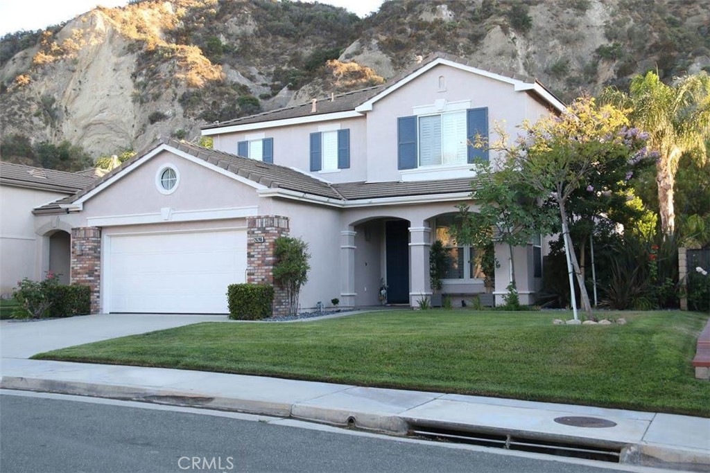 This is no regular home! 5 bed, 3 bath modern pool home. FULL BED+Bathroom (w/shower) ON FIRST LEVEL. 2019 LG 7kw solar system w/ Enphase IQ micro inverters and envoy, 100% owned outright! A N14-50 240v electric car charger in garage. All windows are covered w/plantation shutters. Downstairs has designer tile, surround sound, designer stone accent walls and a fully renovated 2016 kitchen w/ marble counters, soft closing cabinets, and stainless steel appliances. Designer light switches, wall paper, and accent walls with high baseboards. Downstairs bedroom, bathroom, laundry room, and direct access to the 2 car garage. Upstairs are 4 good sized bedrooms w/ in-unit closets, linen storage area with granite tops, and a primary suite w/large bathroom with tile floors, dual vanities, a separate tub/shower, and a large in-unit closet w/organizers. The entire primary bathroom was renovated in 2016. The private backyard is made to entertain w/ a sparkling salt water pool w/removable pool fence, built in BBQ w/granite top, a covered patio, and a nice grassy area w/ Dog run, and privacy trees at the rear. Quiet street.