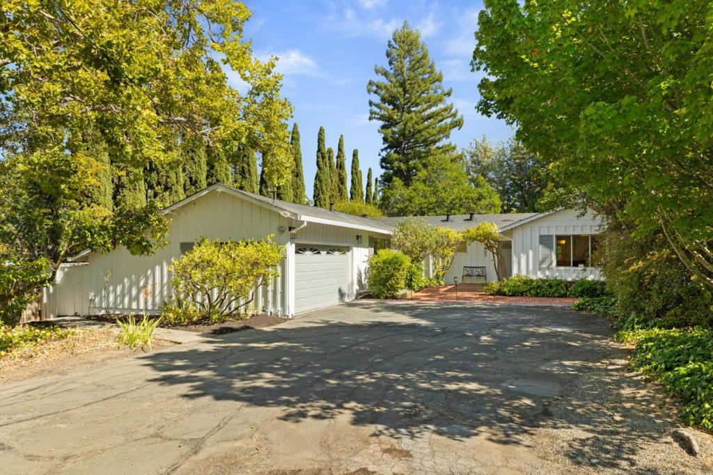 For the first time on the market in over 50 years, properties like this don't come up often! Located on the iconic tree-lined Graceland Avenue in San Carlos, this 2,257 sqft, three-bedroom, two-bathroom rancher with a mid-century modern flare will undoubtedly check all your boxes. Sitting on an almost 19,000 sqft flat, useable lot, this property offers endless possibilities for an ADU, a potential new build, or even that water slide you've always wanted :). With it's prime location, you're just steps from vibrant downtown San Carlos, Burton Park, Eaton Park hiking trails, and have easy access to both Highway 101 and 280. Put on your blue suede shoes and come see 2605 Graceland for yourself while you can!