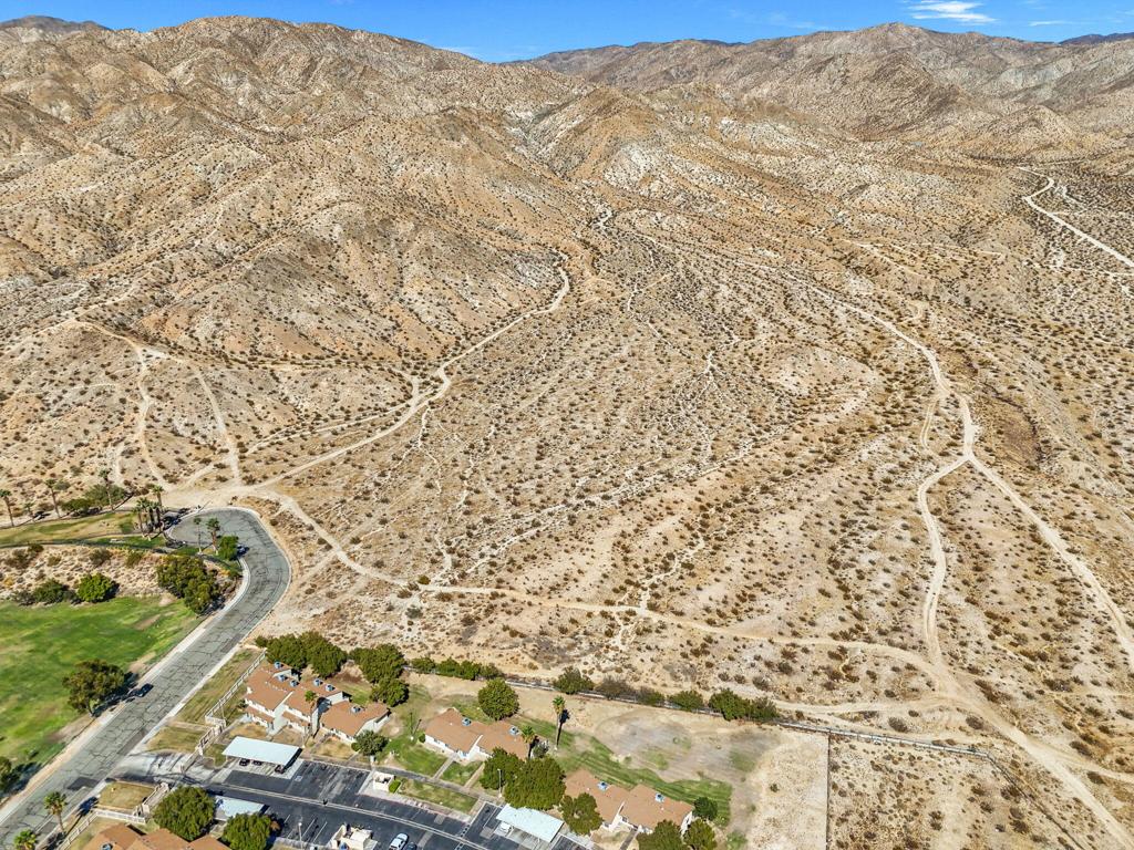 Discover 11.15 acres of prime R-M zoned land, nestled in a tranquil cul-de-sac and adjacent to scenic BLM land. This property offers breathtaking mountain and hillside views, providing a serene and unique setting ideal for future development. While tentative plans exist for a 35-home community, the R-M zoning may allow for the development of up to 230 multifamily units, including apartments, condos, or townhomes, subject to buyer verification and local planning approvals. Located just 7 minutes from downtown Desert Hot Springs and approximately 25 minutes from Palm Springs, this property provides easy access to schools, parks, and essential services, with possible nearby utility connections. Nearby attractions include Cabot's Pueblo Museum, scenic hiking and biking trails, and world-class golf courses. This exceptional site presents an incredible investment opportunity to create a vibrant community in a stunning desert landscape, blending tranquility with nearby conveniences.