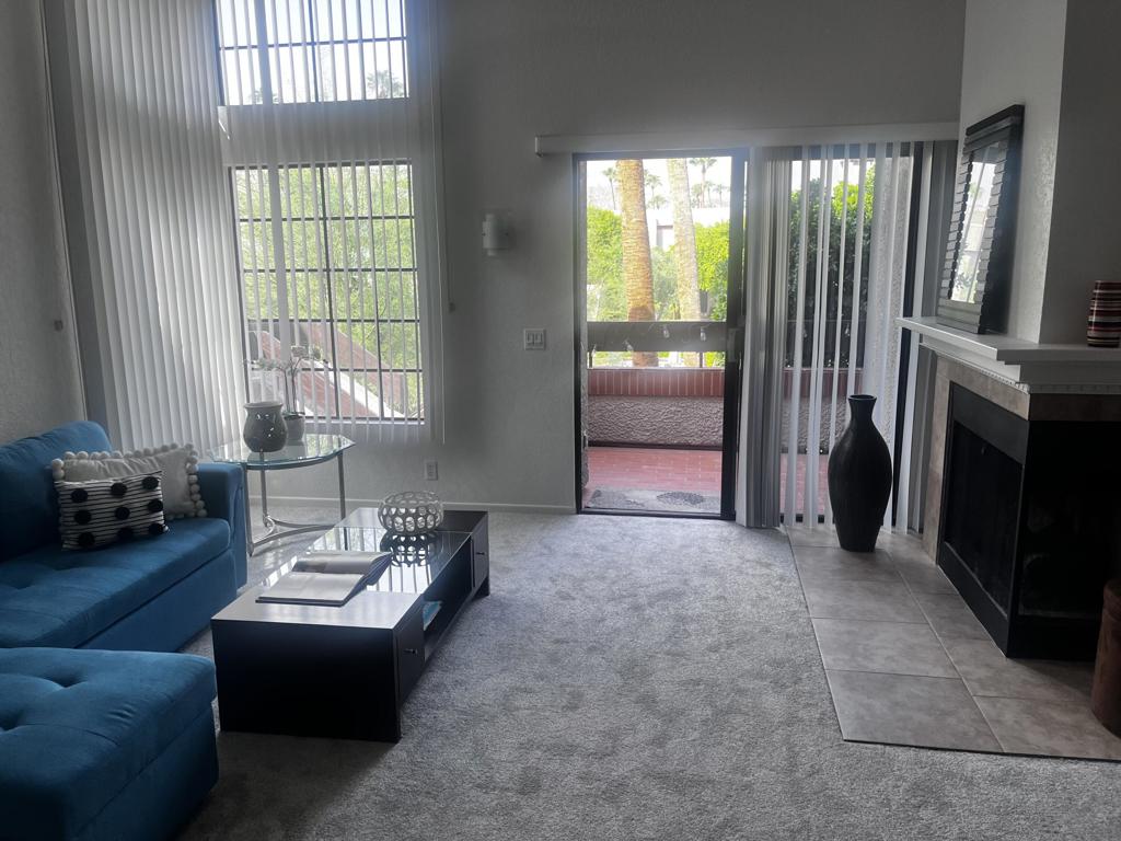 Amazing Upper 2 bedroom 2 bath on feeland (you own the land). With 2 balconies with great views, and fireplace too. Just painted and new carpet installed. Good separation of bedrooms, upgraded kitchen with stainless steel appliances. 2 pools 2 spasclubhouse and assigned parking (#63) close to unit. Short distance to Von's , Trader Joe'sTarget, Starbucks and Tahquitz Creek Golf Course. A Must See !