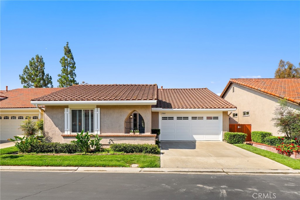 Welcome to this charming Rosa model home located in the vibrant and desirable 55+ gated
community of Casta Del Sol. Nestled in a quiet cul de sac, this sought after 1,503sq ft home offers
serene and easy living. Step into this well maintained 2bedroom/2bathroom dwelling that also has
the extra den or office space, that can be converted into a comfortable third bedroom. The home
features updated windows, vaulted ceilings and abundant natural light. The remodeled kitchen has
recessed lighting and an open concept with plenty of storage for cooking and entertaining. Bright and
airy open living space with a gas fireplace, opens to the side and back patios with recently replaced
covering, allowing a peaceful spot for morning coffee or evening relaxation. Spacious primary
bedroom boasts an en suite bathroom with double vanity and walk in closet. The 2 car garage features epoxy flooring
and offers built in storage along with a ceiling installed storage rack. This lovely
home also has energy and cost saving solar installed with an assumable lease. Community space
offers residents 2 pools, tennis, paddle and pickleball courts, community library, gardens and a wide
variety of activities. Membership to Lake Mission Viejo comes with the home. Enjoy boat rentals,
fishing, swimming and music activities. Come see this spectacular home today!