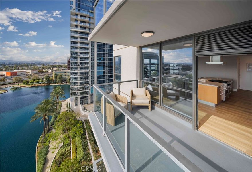 Welcome to Skyline OC — the tallest residential building in Orange County and South Coast's boldest condo transformation, where timeless design meets coastal energy. Ideally located in the heart of Orange County, Skyline OC offers the perfect balance of urban convenience and resort-style tranquility. Just moments from South Coast Plaza, world-class dining, performing arts, and major business hubs, this exceptional address puts everything within easy reach—while still feeling like a private retreat.



Luxury lives large in Residence N2102, an L Plan home with 11-foot soaring ceilings and floor-to-ceiling glass that floods the space with natural light. At ~1,576 square feet, this 2-bedroom, 2-bathroom stunner features a chef’s kitchen with waterfall-edge countertops and professional grade Viking appliances. The oversized terrace runs the full length of the living room, offering sweeping views over the pool and lake. In the primary suite, you'll find a massive walk-in closet and a spa-inspired bathroom. This is Skyline OC living at its most elevated.