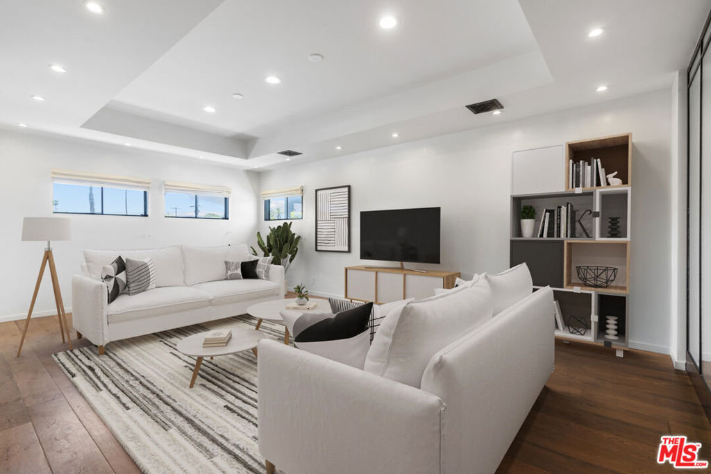 Welcome to your ultimate Venice hideaway in this move-in ready, designer-done residence offering the perfect blend of style, convenience, and versatility. This 1 Bedroom + 2 Bathroom + Office/Den loft spans 1,372 square feet, complete with an incredible 527 square foot private rooftop terrace that seamlessly extends your living space! Tucked away on the vibrant Lincoln Corridor, you're steps from the best of Venice boutique shopping, award-winning restaurants, Whole Foods, Abbot Kinney, Rose Avenue, and the Venice West live music venue! Whether you're looking for a serene home base or a creative space to work and host, this property delivers. The sun-filled open-concept layout features large picture windows framing the lush trellis-covered deck, perfect for morning coffee or sunset dinners. The outdoor terrace is fully finished with stylish decking and shaded awnings, ideal for dining al fresco, entertaining, yoga, or creating an inspiring open-air office. Live in the heart of Venice's energy or take advantage of the live/work zoning to run your business, studio, or creative headquarters. This is lock-and-go living at its finest an urban retreat that combines flexibility, location, and elevated design.