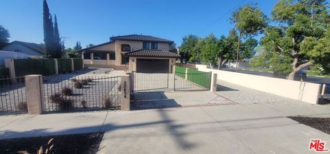 Photo of 20456 Strathern St St, Winnetka, CA 91306 (MLS # 26832163)