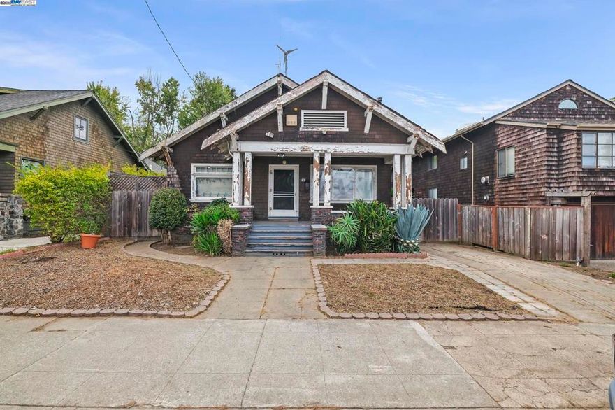 Bring your tool belt and imagination—this Rockridge classic is a fixer with plenty of upside. Inside you’ll find hardwood floors, vintage built-ins, and the quirks of Grandma’s kitchen, all within a traditional layout that offers a living room, dining room, kitchen, laundry room, three bedrooms, and one spacious bath. The dirt-floored basement provides ample storage (or the chance for bold reinvention), while the attic—currently offering peekaboo views of the sky—begs for someone ready to think outside the box. Out front, a welcoming porch sets the tone, while the long driveway to a side gate lead to a large, private yard—once a gardener’s paradise and ready for its next chapter. The location is tough to beat: just blocks to College Ave, moments from Rockridge BART and Trader Joe’s, plus shops, cafés, and freeway access right at your fingertips. Perfect for the visionary ready to transform a diamond in the rough into the neighborhood’s next gem.