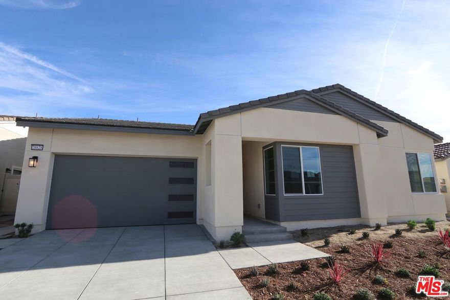 NO MELLO ROOS and Solar Power is owned and included. New construction by Tri Pointe Homes, live the Altis 55+ lifestyle with a community clubhouse (The VuePoint) that includes sprawling outdoor vistas, game room, event bar, workout studio, pool, hot tub, open space, community BBQ and monthly community events! Pickleball courts, putting green, trails and more complement this gated location. Floorplan is a single-level home that features 2 beds/2.5 baths and is nestled on a cul-de-sac. The home features designer-curated upgrades including luxury vinyl plank flooring in main living areas, white shaker cabinets throughout, and Quartz kitchen countertops.
