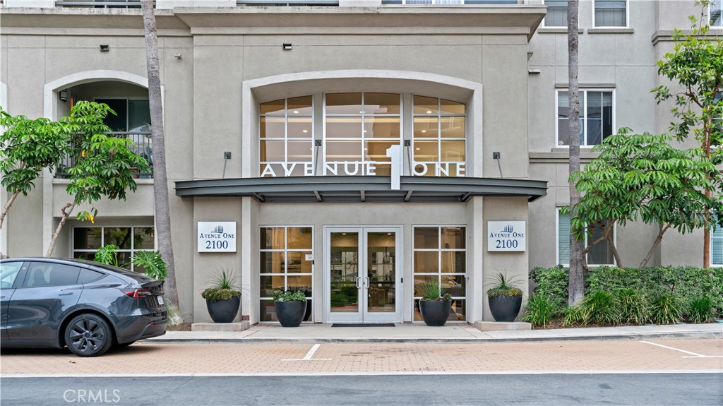 Ground-level condo in one of Irvine’s most sought-after resort-style communities, Avenue One! Enjoy a serene, low-maintenance lifestyle with everything you need. This clean and spacious 2 bedroom, 2 bathroom condo offers the perfect blend of comfort & convenience. With in-unit washer and dryer, along with each room having their own restroom- this condo is the perfect set up for anyone looking to step into homeownership in the beautiful city of Irvine. It’s also just steps from the pool, a quick 30 second walk to 2 assigned parking spots, and near all community amenities. Enjoy access to a private indoor basketball court, & state-of-the-art gym—all designed to elevate your lifestyle. Situated just minutes from UCI, close to the 405 freeway, and surrounded by amazing dining options, this home is ideal for students, professionals, and anyone looking for prime Irvine living.