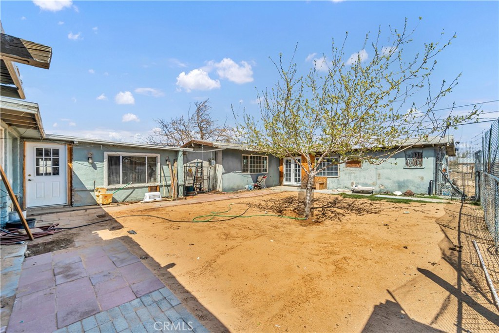 GREAT INVESTMENT OPPORTUNITY!
Rent the homes out, and then rent the lots!
This sale includes 3 lots, 2 houses, and a large shop (APN's Below). The two addresses for the houses are 26445 & 26447 Twenty Mule Team Rd. The front house is 3 br / 3 ba and the back house is 3br / 2 ba. Both properties are in need of some repairs. The front house is being sold with a gas stove, Refrigerator, & dishwasher. The homes have gas water heaters. Laundry machines do not convey.