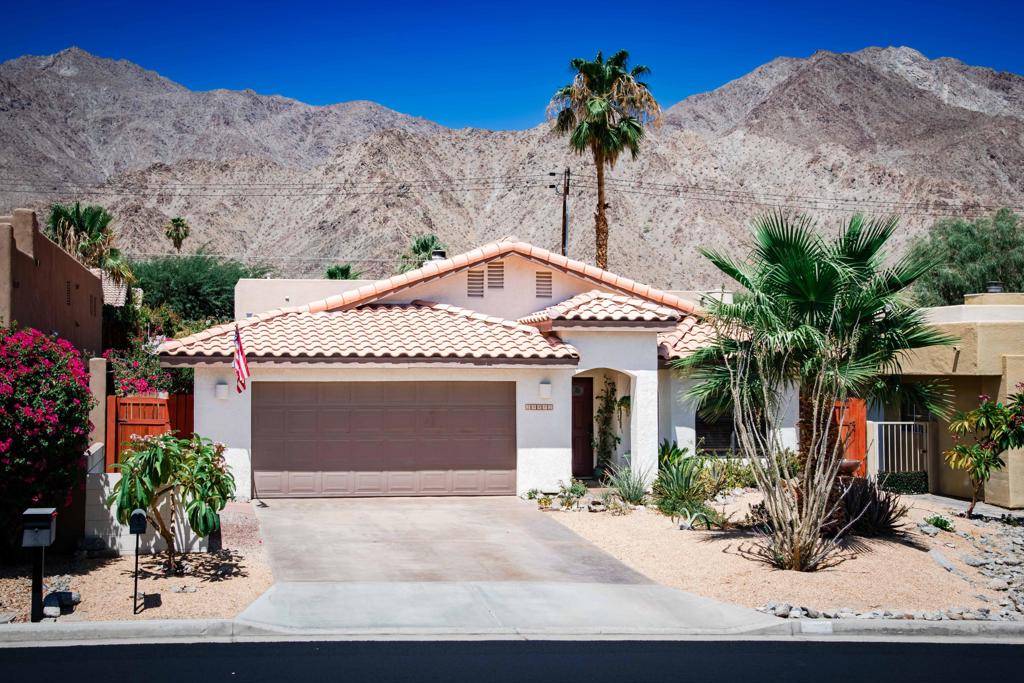 Discover your desert sanctuary in this meticulously maintained, move-in ready, 3BR/2BA, 1660sq.ft home, nestled high in the coveted La Quinta Cove. Built in 1995, this residence boasts a popular open-concept floorplan, featuring high ceilings, a spacious great room seamlessly connected to the kitchen and dining area--ideal for effortless entertaining. The well-designed layout ensures privacy with nice separation from the bedrooms. There is room for tons of storage in the garage.Step outside to your private tropical oasis, where a sparkling 28' salt water lap pool and low-maintenance front landscaping create the perfect backdrop for relaxation. Enjoy the best of La Quinta living, just moments from the renowned Bear Creek hiking trails and the vibrant Old Town, offering world-class dining and shopping. Your dream home awaits!