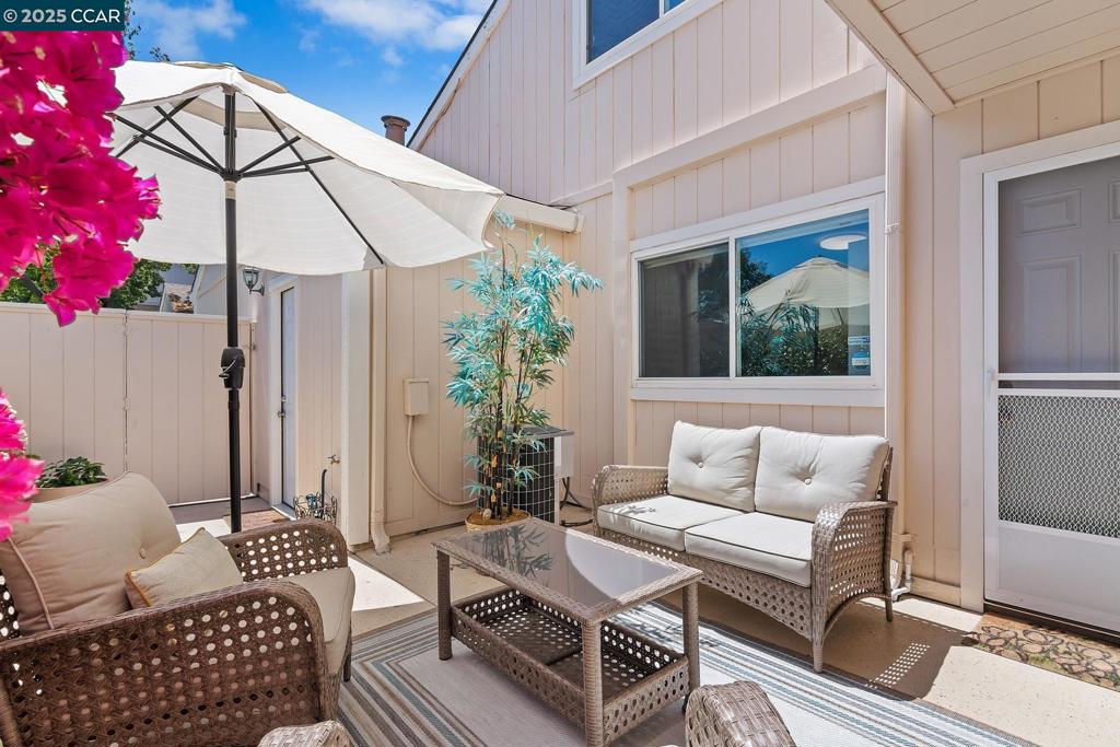 OPEN SUNDAY, JULY 27th 1-4pm - Located in a quiet, semi-private community, this updated 3-bedroom, 2.5-bath townhouse offers a smart layout and quality upgrades throughout. The main living area features soaring ceilings and a cozy fireplace, creating a bright and comfortable space to relax or entertain. The kitchen includes quartz countertops, and modern appliances, perfect for everyday cooking or hosting. One of the three bedrooms is on the ground floor—ideal for guests, or a home office. Upstairs, the bedrooms are spacious and have plenty of natural light. All bathrooms have been updated with clean, modern finishes. There is crown moldings in the entry, kitchen, dining room and primary bedroom. Storage is easy with a walk-in pantry, under-stair closet, and a finished two-car garage. The private patio is low-maintenance and great for outdoor dining or downtime. This is not a flip—it’s a well-cared-for home that’s move-in ready. Located close to top-rated schools, downtown, trails, freeways, and BART, it’s a great fit for anyone looking for convenience, comfort, and value in one package. Don’t miss this one.
