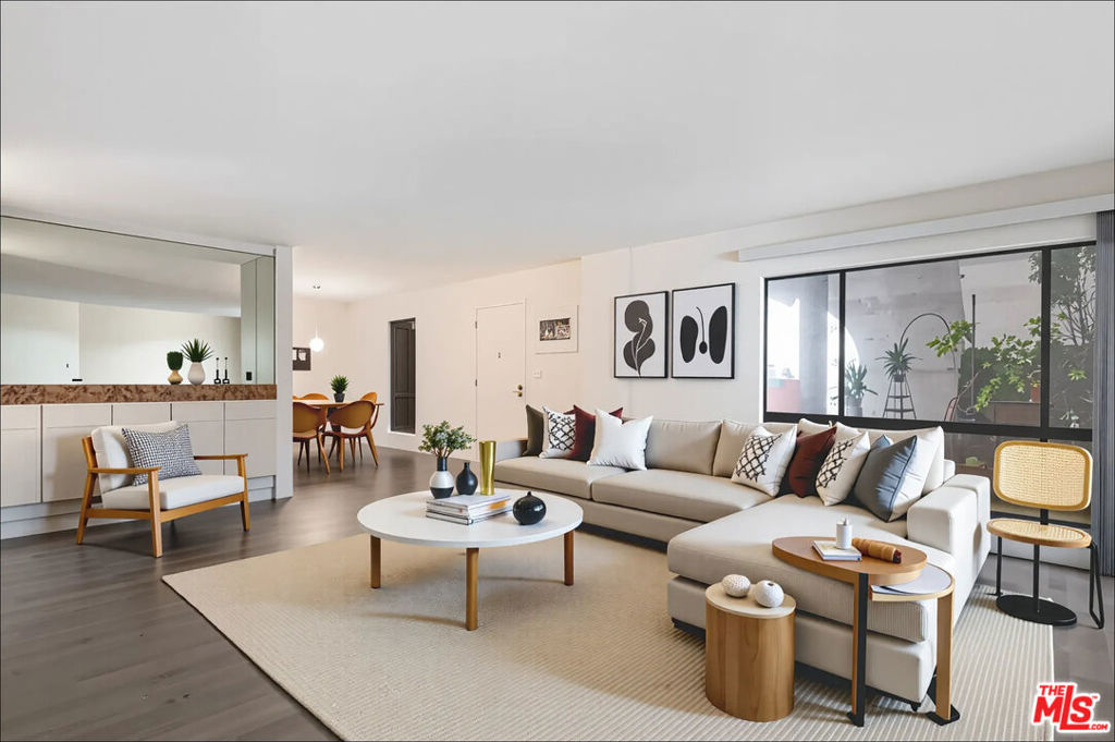 Welcome to the opportunity to own a beautifully upgraded residence in the heart of prime West Hollywood. Perfectly situated just moments from the city's most renowned restaurants, trendy cafes, and premier shopping destinations, this exceptional home blends modern living with unmatched convenience. This thoughtfully upgraded unit boasts a bright, open-concept layout designed for both comfort and style. High-quality finishes, and contemporary updates make this home a standout in today's market. Whether you're entertaining guests in the sparkling pool and spa, outdoor BBQ grill, or enjoying a quiet night in, the value and location is unmatchable. Positioned as one of the most valuable and competitively priced properties on the market, without compromising location, style, and affordability. Photos are digitally staged.