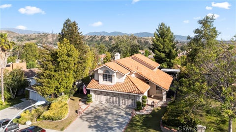 Photo of 22120 Grovepark DR, Saugus, CA 91350 (MLS # CV26109792)