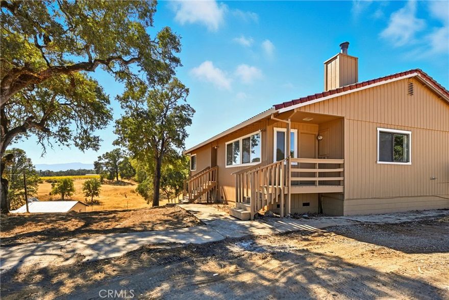 Beautiful 10+/- acres in South Lakeport! All useable, level, rolling oak studded 9.61ac complete with a solid built 2280sqft one story home. All main level living with 2bed/2baths, bonus room/office (3rd bed??), open kitchen and living floorplan, tile roof, & all electric. Lower level is an additional 2000sqft+/- including a large 2 car garage and huge space in addition to the garage perfect for a workshop, gym, daycare, game room, so many possibilities! Was designed to be an additional TWO bedrooms but never completed. Home is just waiting for its new owner to update it and make it all theirs! Detached older shop that was once a granny unit type home, needs some TLC. Gorgeous views of Mt. Konocti and the surrounding vineyards. Could be a great horse property (Zoned AG!) & TONS of room to build a barn, shop, secondary garage, or maybe even ADU. Located on a dead end road, right in between Lakeport and Kelseyville, near local airstrip and only minutes to local wineries & tasting rooms. Home is on well & septic, can work for VA loans with clear pest report on file. Must see for any buyer looking for a home to make their own with a few cosmetic upgrades & on a beautiful private piece of land!
