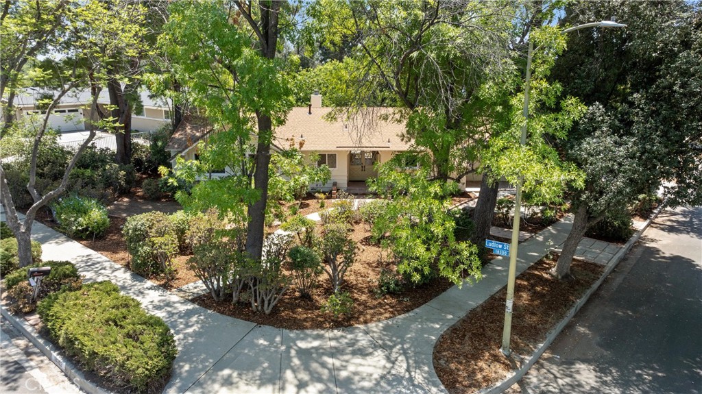 Beautifully Remodeled Ranch-Style Pool Home on a spacious Corner Lot! Perfectly situated on a picturesque corner lot, this stunning home welcomes you with its charming curb appeal and mature, graceful trees that frame the property. Step inside and experience a beautifully remodeled ranch-style home where modern elegance meets timeless comfort. The open and thoughtfully designed floor plan flows seamlessly from room to room, creating an inviting space for both everyday living and entertaining. The brand-new custom kitchen is a true showstopper, featuring sleek custom cabinetry, gorgeous countertops, and upscale appliances. Whether you’re enjoying a cozy family breakfast or hosting friends for wine and appetizers - this kitchen is the ABSOLUTE HEART of the home. Both bathrooms have been renovated from top to bottom - with new flooring and stylish finishes! The entire home boasts beautiful refinished hardwood flooring throughout. Step outside into your private backyard oasis. Enjoy warm summer days in the sparkling pool or relax under your shaded patio - all sitting on an expansive 11,000+ sq. ft. lot, offering endless possibilities.
This home truly has it all—style, comfort, and space in a desirable location. Don’t miss the opportunity to make it yours!