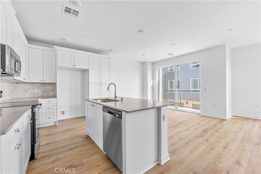 Welcome to Valley Villas, a private, gated community of 58 all-electric, tri-level townhomes. Located just minutes from the 405 freeway, this is the ideal spot for those seeking convenience and easy access to work, play, and everything in between. 



Looking for an affordable, private home without the hassle of a roommate? This spacious corner unit is perfect for you! With 1 bedroom and 1½ baths, this home offers the privacy and comfort you’ve been searching for.



The first floor features a large, 2-car garage, offering plenty of room extra storage, or a workspace for hobbies. On the second level, you'll find 9-foot ceilings, a bright and open living and dining area, plus a powder room for guests. Step out onto the deck, ideal for entertaining or simply relaxing in peace.



The third level is your private retreat, featuring a large primary bedroom with an en-suite bath, a walk-in closet, and a separate laundry area—true privacy at its best!

Savor the Savings with our Fall Blue Tag event! For a limited time, take advantage of rates as low as 4.8% with our preferred lender Great Western Home Loans. Save hundreds on your monthly payment on move-in ready homes