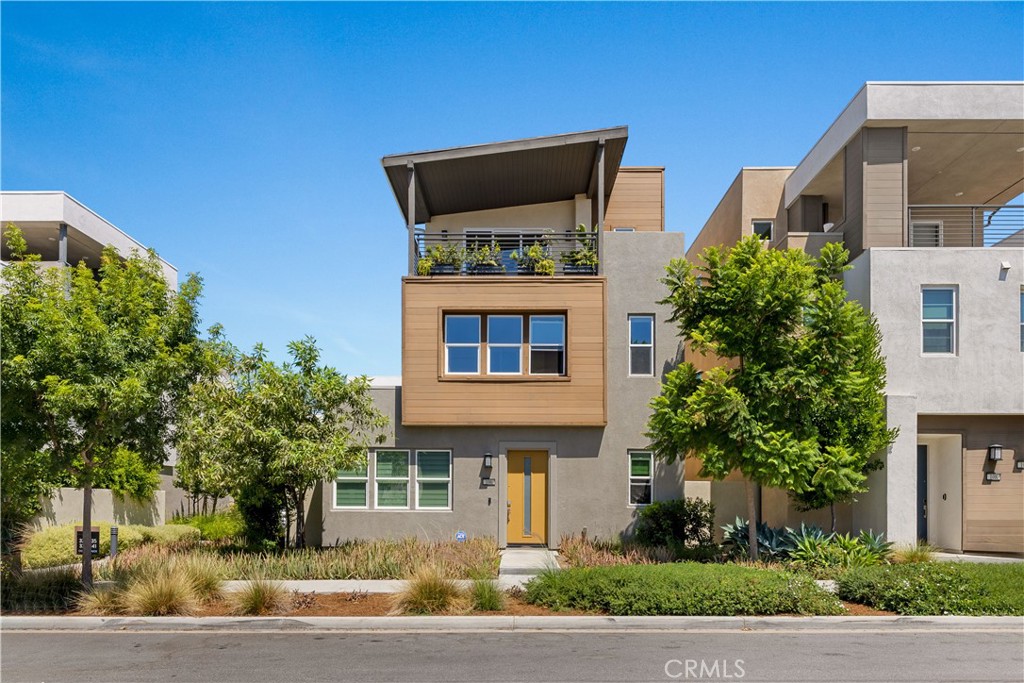 Built in 2021 by Lennar, this stunning detached condominium is located in the highly desirable Rise Park within the Great Park Neighborhoods. Offering 3 bedrooms, 2.5 bathrooms, a third-floor bonus loft, and approximately 2,594 sq. ft. of elegant living space, this residence blends modern luxury with everyday functionality.
The open-concept first floor showcases a chef-inspired gourmet kitchen with quartz countertops, white shaker cabinetry with soft-close drawers, a walk-in pantry, and a large center island perfect for entertaining. The spacious great room and dining area flow seamlessly together, with direct access to the attached 2-car garage. Natural light fills the interiors, creating a bright and welcoming atmosphere.
The backyard has been thoughtfully designed with freshly painted walls, built-in planters, and beautifully cultivated succulents. A balance of modern hardscape and lush greenery creates a warm, cozy setting—ideal for meditation, relaxation, or enjoying quiet outdoor moments.
Upstairs, the expansive master suite offers a peaceful retreat with room for a sitting or entertainment area. All bedrooms are located on the second floor, along with a full laundry room equipped with cabinetry for added convenience.
The entire third floor is dedicated to a versatile loft with sliding glass doors leading to a private covered deck. Bathed in natural light, this space is perfect as a lounge, game room, or creative retreat. From here, enjoy breathtaking sunsets and sweeping city views, crafting the ultimate setting for relaxation or entertaining.
Zoned to award-winning Irvine schools including Portola High School and Cadence Park K-8, and just minutes from Woodbury Shopping Center, Irvine Spectrum, John Wayne Airport, Kaiser Permanente, and major freeways (I-5, 241, 133, 73), this spectacular home delivers comfort, style, and convenience in one of Irvine’s most sought-after communities.