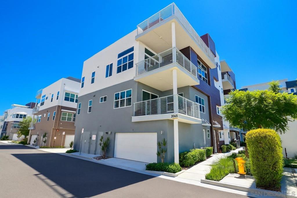 VA Assumable Loan at 3.25%!! Welcome to 2065 Bravo Loop, Unit 6 in the coveted Pinnacle at Millenia! This spacious four-story Plan 6 townhome offers approx. 2,522 sq. ft. with 3 bedrooms plus a flex/bonus space, 3 bathrooms, an attached 2-car garage, and a PRIVATE ELEVATOR! Built in 2022, this modern home is thoughtfully designed for comfort and convenience. The main level features a bright, open-concept great room flowing into the dining area and chef’s kitchen with quartz countertops, large island, full tile backsplash, stainless appliances, and ample storage. A private balcony extends the living space, ideal for morning coffee or evening gatherings. The primary suite offers a walk-in closet and spa-inspired bath with dual vanities, jacuzzi tub, and glass shower. Two additional bedrooms, a full bath, and laundry complete the third level. The top floor boasts a versatile flex space and full bath—perfect for a guest suite, home office, gym, or family/media room—opening to a spacious outdoor living area with sweeping community views. Set in the vibrant, walkable Millenia master-planned community, residents enjoy tree-lined promenades, parks, shopping, dining, and top-rated schools. The new $85M Chula Vista Arts & Entertainment Center and future proposed university further enhance the area’s growth and appeal. With stylish finishes, generous square footage, and an exceptional location, this home is a rare opportunity in one of Otay Ranch’s most exciting communities. VA Assumable Loan at 3.25% for qualified buyer subject to VA/Lender approval.