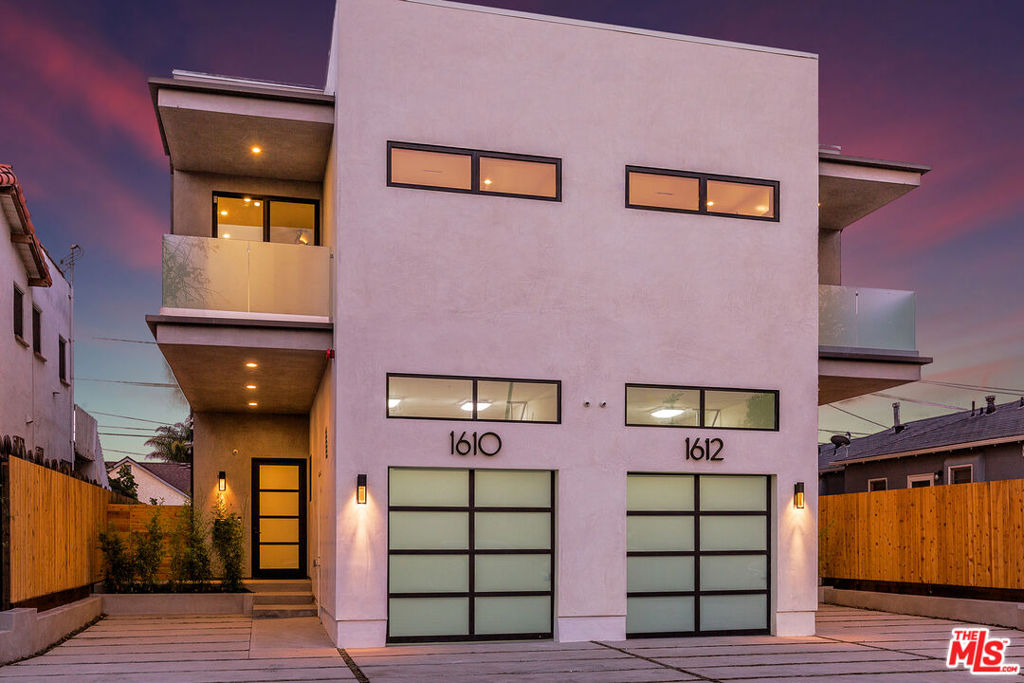 4-Bed, 4-Bath Modern Townhome with Rooftop Deck, Parking & Nearly 3,000 Sq Ft of Luxury Living. First floor features a powder room, laundry room, a custom cook's kitchen featuring two sinks, top-line appliances, quartz counters, large center island, tons of cabinetry, and walk-in pantry. First floor open living floor plan with lots of natural light opens directly to backyard creating a great entertaining space with surround sound speaker system. Second floor has 4 bedrooms, two of which have private balconies. Bedrooms have en-suite bathrooms, and high quality custom closets and woodwork. Each floor's HVAC is controlled by Nest. High-end craftsmanship and finishes with great attention to all details. As a unique bonus, the easily accessible rooftop deck has a great open entertaining area with a barbecue and breathtaking city views. Property has a video surveillance system. *1ST MONTH FREE PROMO - PRICE REFLECTS 12M SPREAD - BASE RENT $9,267*