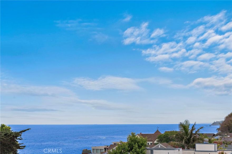 Experience the ultimate Laguna Beach lifestyle in this beautifully renovated ocean-view luxury condo, perfectly located on the ocean side of the highway in the coveted Hip District. Just seconds from the secluded sands of Moss Cove, this sophisticated coastal retreat features designer finishes, new flooring, crown molding, modern lighting, and a sleek kitchen with quartz countertops, a tile backsplash, and custom European cabinetry. Expansive French doors in the primary bedroom open to a private balcony, offering stunning ocean views and seamless indoor-outdoor living. The open-concept layout includes an elegant entertainment wall with an electric fireplace and a built-in 85” Sony TV, while the stylishly updated half bath showcases a chic vanity and gallery-inspired stone backsplash. Additional amenities include a secure building, gated assigned parking, shared bike and surfboard storage, a community laundry room, and a courtyard with a grilling area—perfect for entertaining … And, all with a very low HOA fee! With its prime location near world-class dining, art galleries, and newly upgraded access to Moss Cove, this turnkey home is a rare opportunity to own a slice of paradise in Laguna Beach.