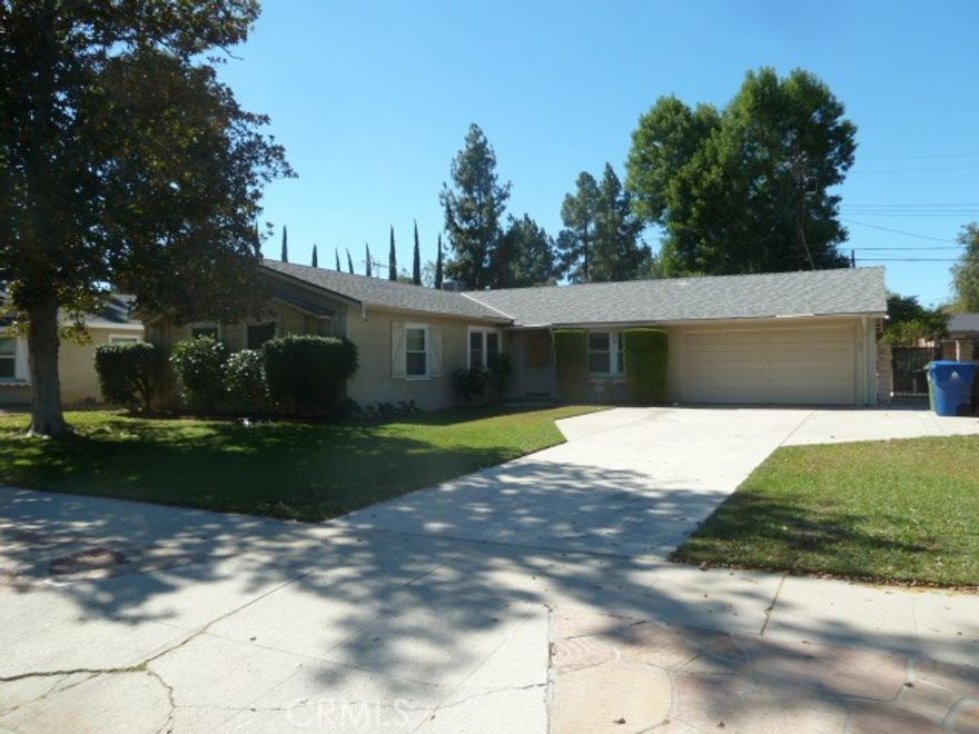 Great neighborhood. Close to shopping. 3 bedrooms, 2 baths, family room. Central  heat and air, solar panels. Private backyard with a sparkling pool and covered patio. Good sized kitchen with plenty of cabinets and counter space. Double attached garage and a long driveway with room for RV parking. Needs some TLC and then it will be super. Got to see it and see the potential to make it yours. Bring your decorating ideas.