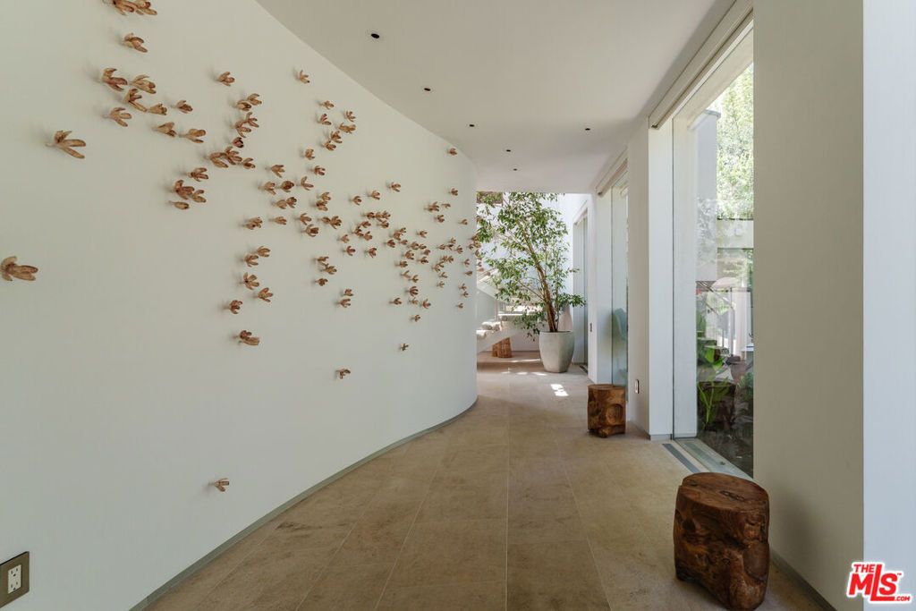 Photo of 14800 Corona Del Mar, Pacific Palisades, CA 90272 (MLS # 25587545)