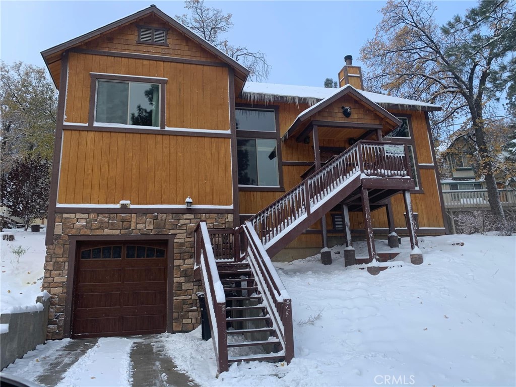 Charming Mountain Retreat in Big Bear. Built in 2015. Welcome to your perfect mountain getaway! Nestled among the pines and just minutes from Bear Mountain Ski & Snowboard Resort, the zoo, a 9 hole golf course and scenic off-road trails, this beautiful cabin offers the ideal blend of comfort and convenience. Featuring 3 spacious bedrooms, 3 full bathrooms, and an oversized 1-car garage, this home is thoughtfully designed with modern amenities including fire sprinklers, dual-pane windows, vaulted ceilings, slate and river rock bathrooms, and gorgeous flooring throughout the main living areas. Outside you'll find a relaxing spa, mezmorizing propane firepit and barrel style BBQ grill, perfect for family entertainment! Enjoy the ease of a level-entry driveway, ample storage, and a multi-level layout that provides privacy and space for everyone. Whether you’re relaxing indoors or enjoying the natural surroundings, you’ll feel right at home. Fully furnished and move-in ready, this property is perfect as a personal retreat or an income producing vacation rental thanks to its prime location and appeal to outdoor enthusiasts year-round.
Don’t miss the opportunity to own this stunning Big Bear mountain home!