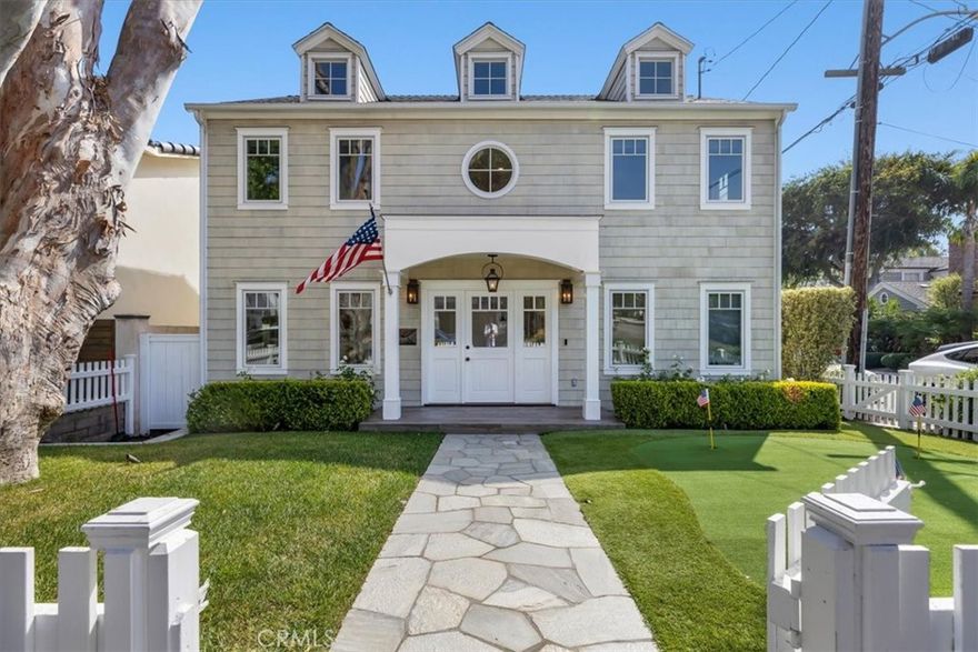 Picture perfect in one of the best locations in Manhattan Beach’s Tree Section! This darling Nantucket style home has captivating corner curb appeal complete with a picket fence and putting green in the front yard! This home exudes joy and warmth upon entering. It’s bright and spacious with 4 bedrooms upstairs plus an office by the entry. The kitchen is an entertainer’s dream with a butcher block center island, custom cabinetry, a wine fridge and beautiful marble countertops. The adjacent family room opens up to a large, private backyard and detached garage. This home features a traditional floor plan with living downstairs and bedrooms upstairs, in addition to an extra bonus area on the main floor. The master bedroom is spacious and has custom built-ins and a walk-in closet. The master bath is serene with double sinks, separate bathtub and shower and marble floors and countertops. All other bedrooms are filled with an abundance of natural light and have brand new carpet. Location is everything in Manhattan Beach, and this dreamy block is located near Pacific Elementary, American Martyrs and close to all of downtown Manhattan Beach.