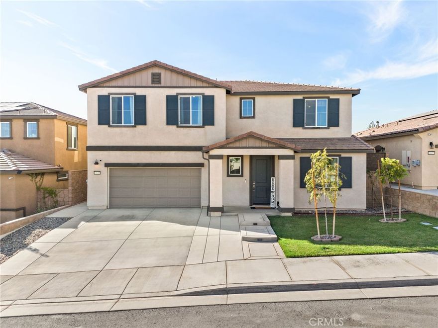 This stunning home boasts excellent curb appeal, pristine upkeep, and low-maintenance landscaping, all with a beautiful view of the local mountains. One of its most valuable features? A fully paid-off solar system—providing significant energy savings from day one with no lease or loan to assume!



Step inside through the elongated entryway to find stylish LVP flooring that flows throughout the main level. A versatile den or home office sits near the front of the home, along with a guest bedroom and a full bathroom featuring a charming shiplap accent wall.



The spacious family room is the heart of the home, showcasing a cozy fireplace framed with a custom shiplap enclosure. The open-concept kitchen overlooks the family room and dining area, offering a large kitchen island, quartz countertops, porcelain tile backsplash, walk-in pantry, and built-in cooktop—perfect for both everyday living and entertaining.



Upstairs, you’ll find a massive loft, an oversized primary bedroom retreat with a deep walk-in closet, and a spa-like primary bath with a walk-in shower. Three additional bedrooms, a bathroom with dual sinks, and a convenient upstairs laundry room complete the second floor.



The backyard is an entertainer’s dream, featuring a large covered patio with lighting and ceiling fans, stamped concrete, a built-in fire pit, rock wall, lush green grass, and beautiful landscaping. A 3-car tandem garage offers plenty of parking and storage space.



Best of all, this home backs up to a large park with a walking trail, sports court, and playground—perfect for outdoor enjoyment. Immaculately maintained inside and out, this property showcases true pride of ownership. With the added bonus of fully paid-off solar, this home is not only beautiful—it's energy efficient and cost-effective for years to come!



This vibrant new community offers an array of amenities, including swimming pools, a splash pad, playground, scenic walking trails, a sports court, fitness center, clubhouse, and so much more!