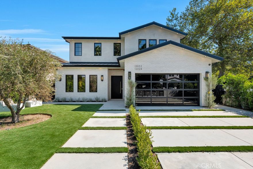 A rare offering in the heart of Studio City this newly built contemporary 5,200 square foot estate captures the perfect balance of elegance, comfort, and cutting edge design. Thoughtfully crafted with 6 bedrooms and bespoke finishes throughout, this residence is ideal for both grand entertaining and effortless everyday living. Inside, soaring ceilings, abundant natural light, and an open concept floor plan create a seamless flow from one space to the next. At the heart of the home is a chef’s kitchen featuring custom cabinetry, a dramatic waterfall Taj Mahal quartz island, top of the line appliances, and sleek finishes. An inviting breakfast nook and effortless indoor-outdoor connection complete the space. Additional highlights include a private home theater for cinematic experiences, a sophisticated office, versatile living areas designed to suit the modern lifestyle, and a fully integrated Control smart home system that puts lighting, climate, security, and entertainment at your fingertips. The luxurious primary suite offers a spa inspired bath, oversized walk in closet, and serene views your personal retreat within the home.

Adding even more flexibility, the property includes a beautiful one bedroom, one bathroom ADU with a full kitchen and flex room perfect for guests, extended family, or income potential. Step outside to a private oasis with a refreshing pool and spa, outdoor kitchen with built-in BBQ, multiple entertaining areas, and ample space to unwind beneath the California sun. Perfectly located just minutes from Ventura Boulevard’s premier shopping, dining, and entertainment, this residence embodies sophistication, comfort, and lifestyle. More than a home, it’s a statement.