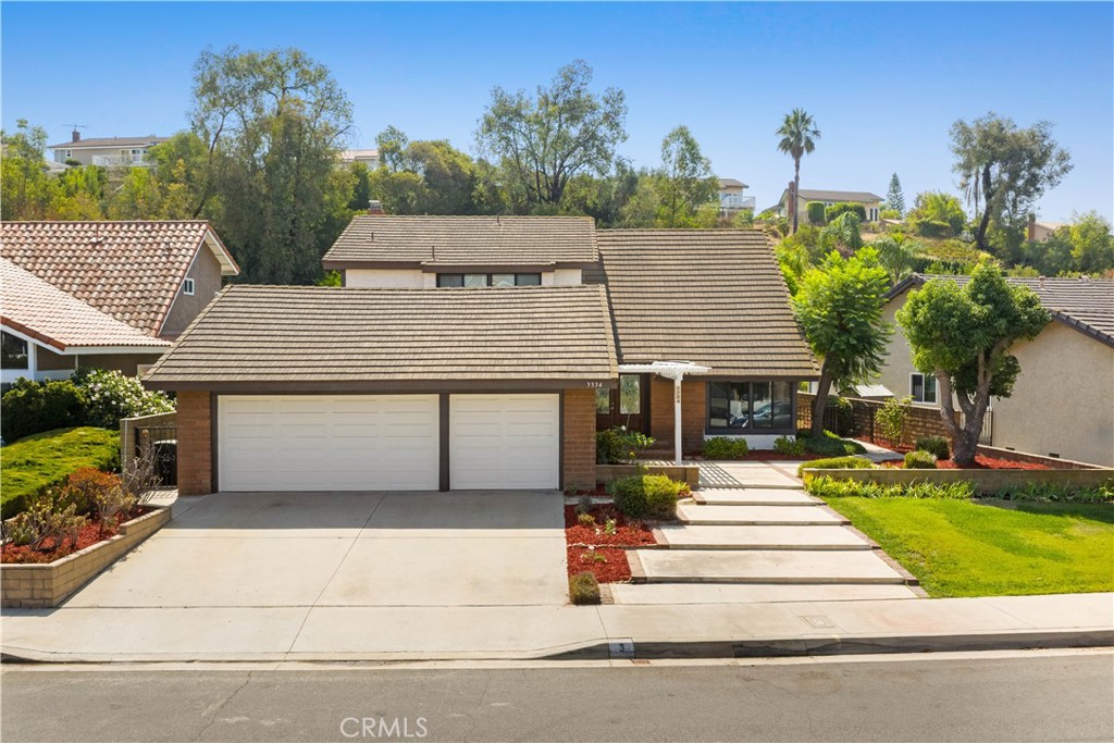Discover your dream home in the highly sought-after city of Diamond Bar, situated within the prestigious Walnut School District! This stunning 2-story home features 4 spacious bedrooms and 3 modern baths across 2,712 sq. ft. of living space, all set on a generous 12,892 sq. ft. lot with a large rear yard ample enough for a potential ADU. Enjoy the inviting living room and cozy family room with a charming fireplace, as well as a beautifully remodeled gourmet kitchen complete with a large island, stylish shaker cabinets, and luxurious quartz countertops. This home boasts a convenient main floor bedroom, an elegant upstairs master suite, and a 3-car garage. Additional highlights include a durable tile roof, copper plumbing throughout, stylish bamboo flooring, brand new carpeting, and two tankless water heaters for endless hot water and a soft water system. Don’t miss this rare opportunity to own a beautiful property in one of Diamond Bar's most desirable neighborhoods—your perfect family home awaits!