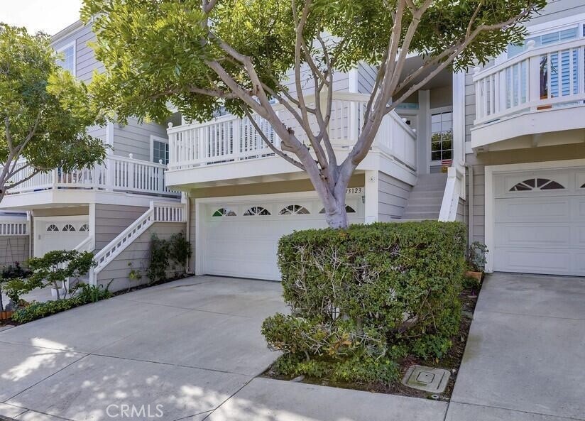 This is the home you have been waiting for!
This stunning, newly remodeled 3-bedroom, 2.5-bath home in the highly desirable Marinita, a gated community in Dana Point, is truly exceptional. This coastal home offers an open floor plan, spacious ceilings, and is filled with natural light. It has recently undergone an extensive and meticulous renovation, with attention to every detail, making it even more spectacular.
As you step inside, you'll be greeted by a spacious living area featuring a fireplace, vaulted ceilings, and warm wood floors. Sliding doors open to a tranquil deck and a generous patio. The dining room is perfect for entertaining and family gatherings.
The remodeled chef's kitchen is a culinary dream, boasting gorgeous quartz countertops with a full backsplash, recessed lighting, premium appliances, a spacious pantry, and a breakfast bar. The family room is conveniently located next to the kitchen, and just outside, the private back patio is ideal for alfresco dining, barbecuing, or simply relaxing with a book.
Upstairs, you'll find all the bedrooms. The private primary suite is a true retreat with a walk-in closet and a romantic fireplace. Its spa-like en-suite bathroom features twin sinks, an upgraded shower, stone counters, a freestanding tub, and high ceilings that allow plenty of natural sunlight to fill the space. The generously sized second and third bedrooms are down the hall and share a lovely bath with a soaking bathtub. All bathrooms have been renovated with new vanities, mirrors, fixtures, lighting, cabinets, and countertops, adding a touch of modern elegance. This unit also includes a 2-car attached garage with EV Charger, a generous driveway, and ample street parking for guests.
Residents enjoy resort-style amenities within this gated community, including a swimming pool, two spas, a tennis court and club house. The property is conveniently located near award-winning schools, shops, dining, beaches, walking trails and is just 1.5 miles from Dana Point Harbor, which is undergoing a $300+ million renovation.
This property offers an exceptional lifestyle of comfort, convenience, and coastal elegance. We invite you to schedule your private showing today – this is a wonderful opportunity you won't want to miss.