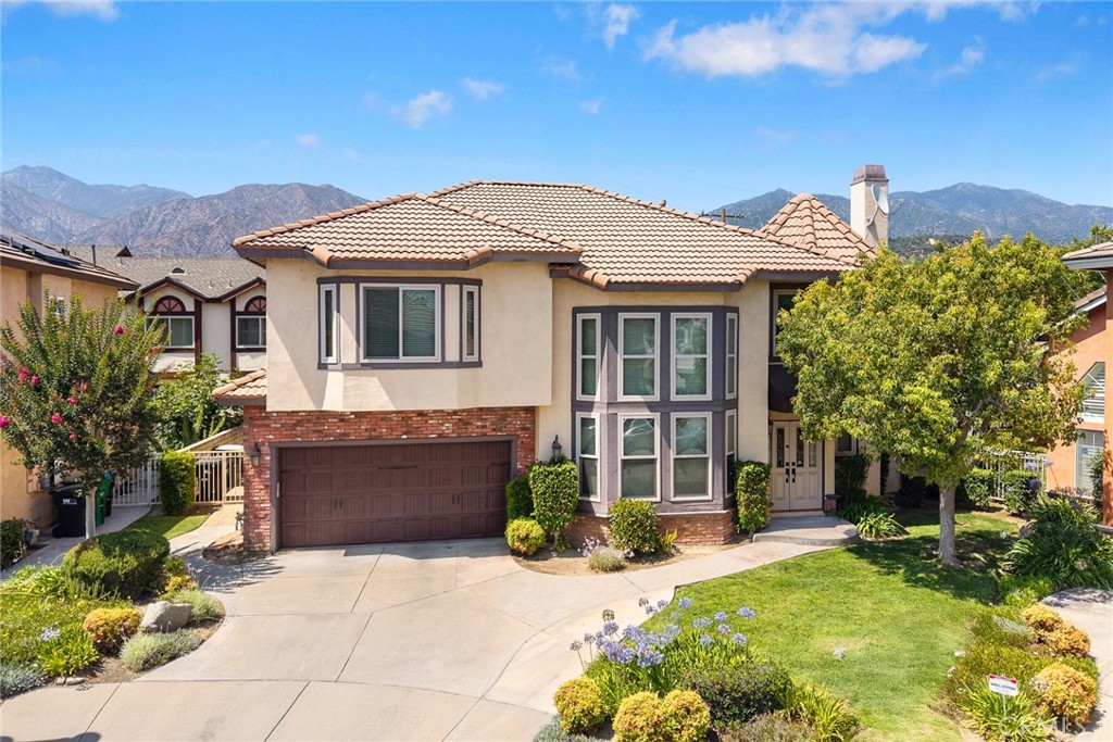 Welcome to this beautifully remodeled, turn-key home located on a quiet cul-de-sac in the highly sought-after Highland Oaks neighborhood of Arcadia. This elegant two-story residence offers 4 bedrooms and 3 bathrooms with a spacious 2,720 sq.ft. of living space. Thoughtfully updated throughout, the home features a bright and open floor plan with large bay windows, fresh finishes, and exceptional curb appeal. The main floor includes a desirable downstairs bedroom with a full bathroom—perfect for guests or multi-generational living. Upstairs, you’ll find generously sized bedrooms and updated bathrooms designed for comfort and convenience. Enjoy stunning mountain views and a prime location just minutes from award-winning Highland Oaks Elementary and Foothills Middle School in the top-rated Arcadia Unified School District. Close to parks, shopping, dining, and Ralphs Fresh Fare, this move-in ready home blends modern living with an unbeatable location.