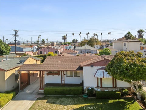 Photo of 1438 W 94th Street, Los Angeles, CA 90047 (MLS # SB26215931)