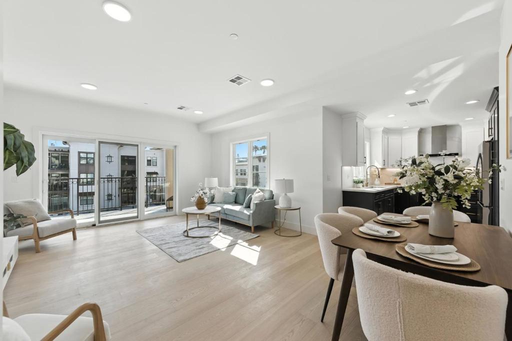 Twenty-four newly constructed luxury condo homes located in the heart of Downtown San Carlos, just steps away from dining, shopping and transit. This four story building features eight homes on each floor with a total of ten unique floor plans to choose. Step inside of this spacious 2-bed / 2-bath model home with private balcony. Elegant recessed lighting and engineered hardwood flooring creates a comfortable ambiance. The gourmet kitchen comes equipped with stylish finishes, quartz countertops, and new high-quality appliances. The spacious primary suite offers plentiful closet space and an ensuite bathroom with adaptable shower, dual sink vanity and LED mirror with defogger. Buyers may upgrade the shower in the primary bathroom with a tasteful glass sliding door. In-unit stacked washer and dryer are included, and assigned parking spaces are located in the securely gated garage. The building is monitored by exterior security cameras for added peace of mind. Two commercial properties are at street level, with one zoned as a restaurant. Residence will enjoy close proximity to bustling Laurel Street, San Carlos Caltrain Station and San Carlos Public Library. Schedule a private tour today and see why San Carlos is considered the "City of Good Living"!