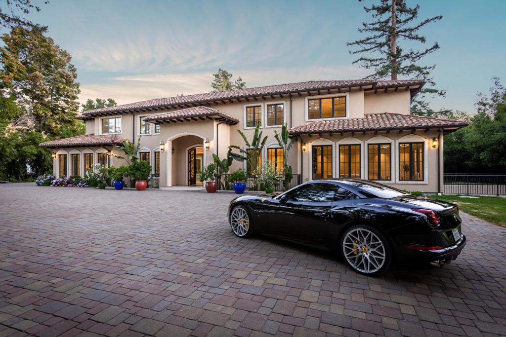 Major Price Improvement! Evoking an air of timeless elegance, this showstopping 6bd/7.5ba estate is tucked behind private gates in one of Atherton's most coveted enclaves. An idyllic sanctuary nestled in trees, the Mediterranean inspired modern oasis boasts voluminous rooms and a functional floor plan of light-soaked luxury in a resort-like setting. Met with 9' front doors, guests are ushered into a grandiose entry foyer with floor-to-ceiling glass, lavish staircase, 23' to an ethereal rotunda. Custom built in 2014 with impeccable craftsmanship and steel frame construction, the tri-level residence has been meticulously designed with indoor/outdoor entertaining and living in mind. Lower level poised for revelry, with guest suite, bar, wine cellar, theater, game room. 4-Car garage with EV charging, this exquisite estate cues up five-star feels with a pool, hot tub, cabana, outdoor kitchen, & dining room pavilion. America's priciest zip-code located midway between SF and Silicon Valley.