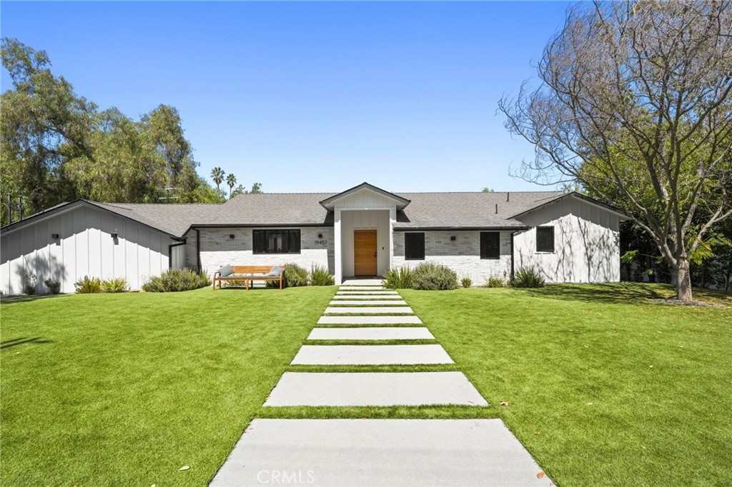 Gorgeous South of the Boulevard Estate in Tarzana!
Welcome to 19457 Collier St—a stunning, fully remodeled home rebuilt from the ground up, where luxury meets comfort. This expansive residence features 5 bedrooms, including 4 en-suites with beautifully designed bathrooms and generous closets. The primary suite is truly remarkable, boasting a huge walk-in closet and a bathroom retreat.
The open-concept floor plan is designed for modern living, with seamless flow between the gorgeous chef’s kitchen, spacious dining area, and large family room—all with direct access to the backyard oasis. The kitchen is complemented by a large walk-in pantry, while a separate laundry area with extensive cabinetry adds both convenience and storage.
Step outside to your private resort-style backyard, complete with a sparkling pool, expansive deck, and low-maintenance artificial grass—ideal for entertaining or simply relaxing.
Additional highlights include a 2-car garage, ample storage, and full gated security. Perfectly situated south of the boulevard in Tarzana, this home combines elegant finishes with everyday comfort, all just moments away from shopping, dining, and top-rated schools.