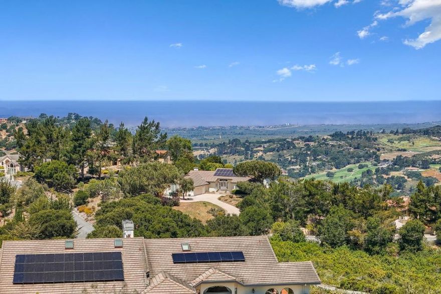 Bay Views, ADU, 8-Car Garage & More Set on a private 1.91-acre knoll with expansive views of the bay and the rolling hills along the Highway 68 corridor, this exceptionally maintained estate blends scale, comfort, and versatility. The main residence features vaulted ceilings, exposed beams, and sunlit living spaces that flow seamlessly to the outdoors. An oversized primary suite offers a serene retreat, while additional highlights include a media room and a 1,300-bottle wine cellar. The detached ADU adds flexible living options for guests or multi-generational needs. With an 8-car garage, owned solar, and true pride of ownership throughout, this home delivers efficient living and timeless appeal in a quiet, sought-after setting surrounded by natural beauty.