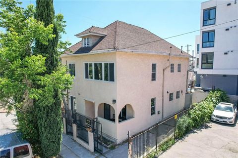 Photo of 1311 Dewey Avenue, Los Angeles, CA 90006 (MLS # PW25161297)