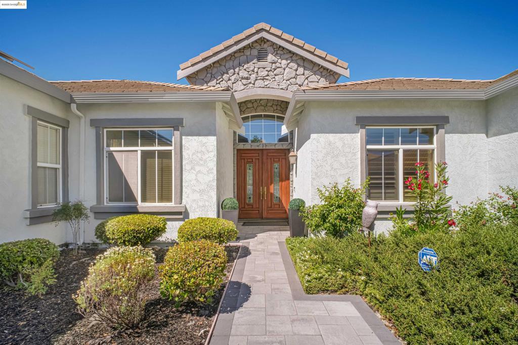 Single story with over 3000 sq. ft. Crown molding through out. Travertine tile in living space. 2nd garage can be ADU with build out. RV parking space. Large backyard with putting green N Gazebo with Spa. Solar is paid for .