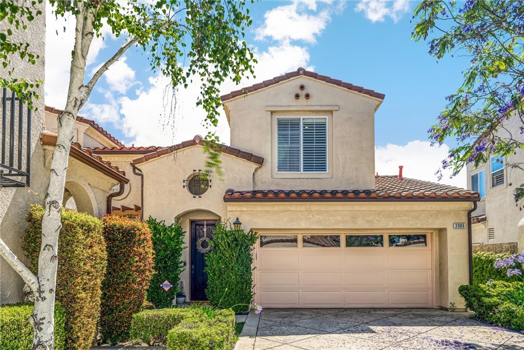 Welcome to this beautifully appointed 4-bedroom, 3-bath home located in the highly desirable Mirabella community of Moorpark. Offering 2,019 SF of well-designed living space, this charming residence blends style, comfort, and functionality. Step inside to soaring vaulted ceilings and abundant natural light. The main level features a formal dining area, a comfortable living space, cozy fireplace and a chef’s kitchen with granite countertops, a large center island, ample cabinetry and a breakfast nook — perfect for entertaining and daily living. The versatile floor plan includes one full bedroom and full bath downstairs, ideal for guests or a home office. Upstairs, the primary suite offers a peaceful retreat with a luxurious en-suite bath featuring a glass-enclosed shower, separate soaking tub, dual-sink vanity and walk-in closet. Two more bedrooms, a full bath and the laundry room round out the second floor. This home also boasts real wood flooring, plantation shutters and an attached two-car garage. Enjoy outdoor living in the private backyard with a covered patio, or take advantage of the community pool, bbq area and clubhouse, all ideal for relaxing or hosting gatherings. It is conveniently located near parks, shopping, and top-rated schools. Don’t miss this exceptional opportunity!