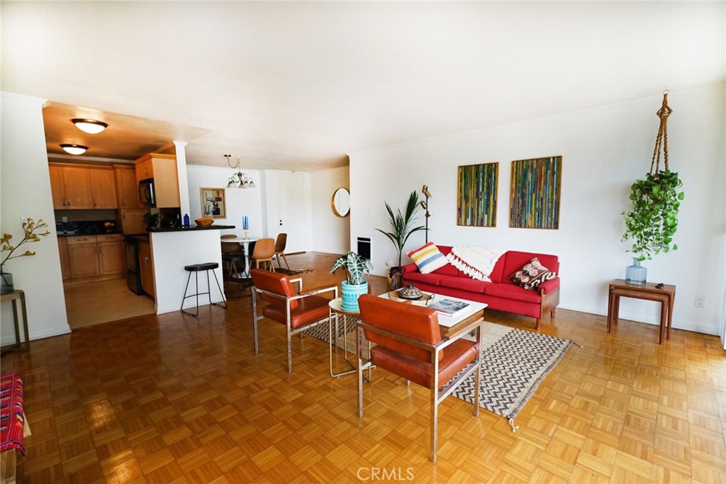 This rarely available end unit with just one shared wall is one of the biggest 2-bedroom homes in the coveted C building. With ocean views from the balcony that stretch to Catalina on a clear day, this home does not disappoint. The kitchen has been tastefully updated with granite countertops and new cabinets, and the two large bedrooms, one with a master suite and walk-in closet, offer plenty of space to stretch out and relax. Sliding doors off the living room lead to a spacious balcony and let in plenty of natural light. Unit comes with two assigned parking spaces and a storage unit. This gated community with pools, spa, BBQ area, gym, sauna and club house is close to parks, Los Verdes CC, horse trails and, of course, award-winning Palos Verdes Schools. Unit comes unfurnished. Available on August 1.