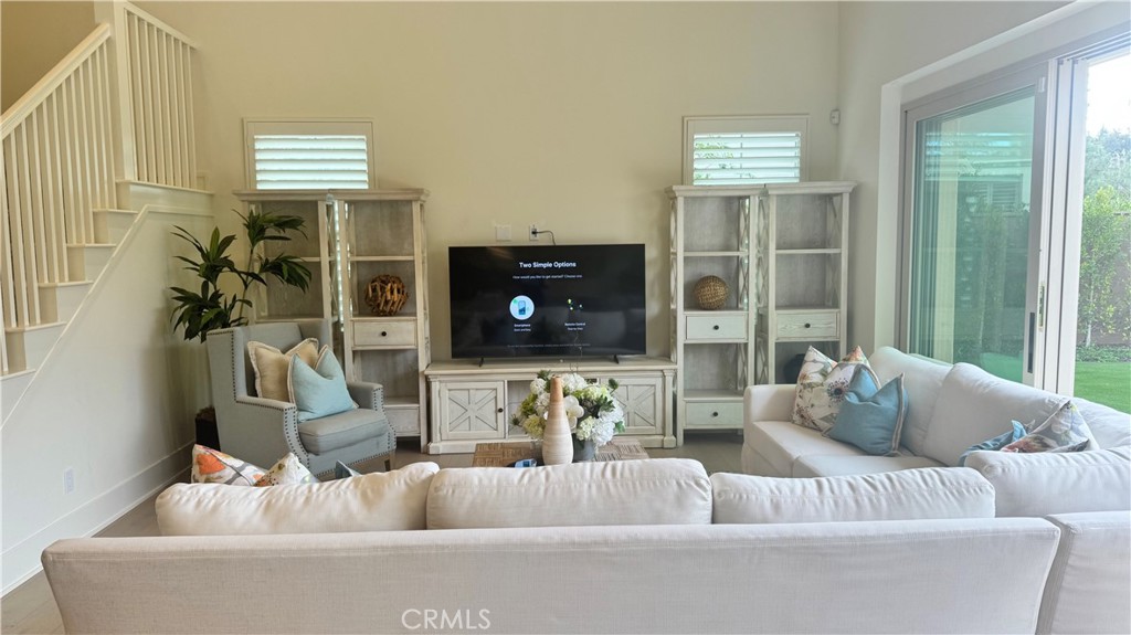 Welcome to this *** fully furnished *** exquisite former model home, located in the prestigious guard-gated community of Orchard Hills. Built just a few years ago, this stunning property combines modern design with thoughtful upgrades, offering the perfect balance of sophistication and comfort. Key Features are; 4 Bedrooms & 4.5 Bathrooms: Generously sized, with premium finishes throughout. Loft & Office/Play Area: Flexible spaces to adapt to your unique needs ideal for work, study, or play. Vaulted Ceilings: The Great Room showcases dramatic ceilings, filling the space with light and grandeur. A gourmet kitchen with top-tier appliances, custom cabinetry, and ample space for culinary creations.Expansive Backyard designed for relaxation and entertaining, with plenty of room to create your outdoor haven. This home isn t just about beautiful interiors it s located in one of the most desirable neighborhoods in Irvine, known for its Top-Rated Schools, Easy access to shopping, dining, parks, and recreational trail with Community Amenities such as Pools, parks, and walking paths to enjoy year-round. Step into a lifestyle of luxury, comfort, and convenience... With every detail thoughtfully designed, this home is waiting for someone to make it their own. Schedule a tour today!