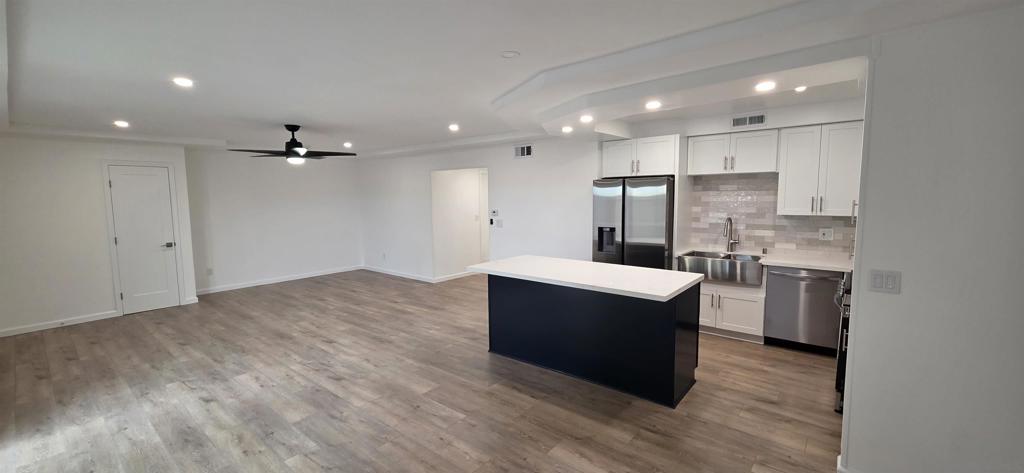 This condo has been completely remodeled. Hardwood floors throughout. Bathrooms completely remodeled, new kitchen and appliances. New canned lighting throughout the unit. One large patio in back off the master and another smaller patio in front, both enclosed and fenced off for privacy. 1 guaranteed carport parking space and 1 permit parking that allows you to park in permit spaces. Complex has pool, jacuzzi and tennis courts. Very close to SDSU campus so great for students or investment for parents.