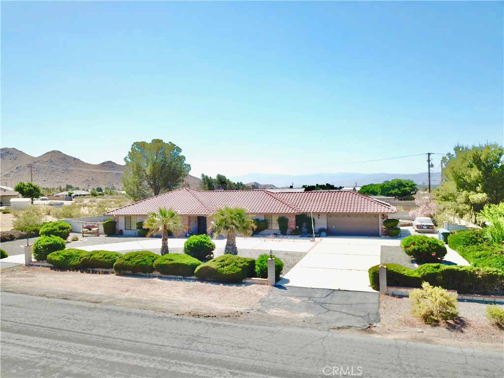 This is an Amazing Property. In a Great Location of Desert Knolls in Apple Valley. This home has many extras, Heavy Duty Custom Iron & Glass Doors Exterior & Interior. Solor, 3 Bedrooms 2 Full Bathrooms, Master Bath has a Hydrobath, Lots of space inside and outside. Living Room, Family Room with Custom Fire Place, Plantation ShuttersKitchen built in appliances,Laundry Room, Tankless Water Heater, Sprinklers in hte Front and Back Yard. RV Parking, Shed on the side of the home, Plus much more this is a Must See Bring your Buyers.