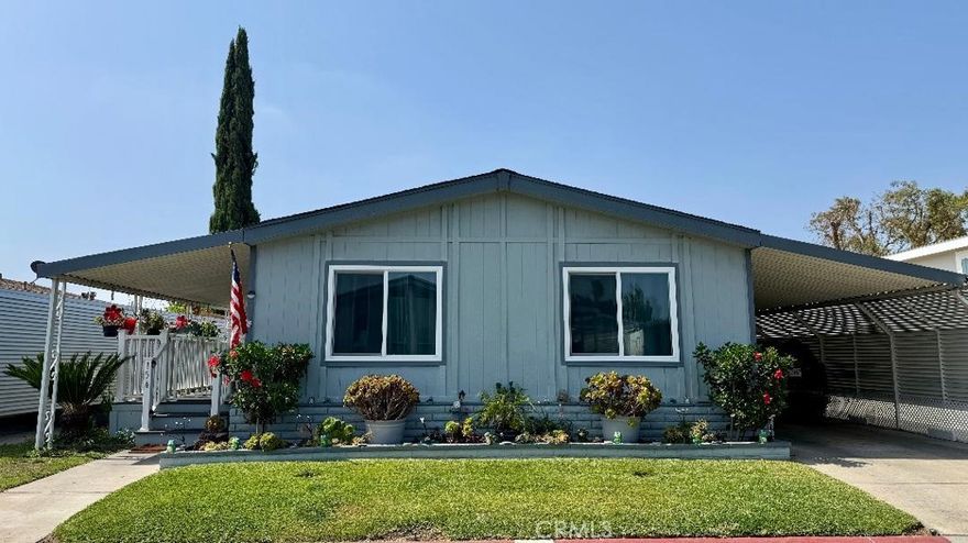 This home is beautiful, sits in the Rancho Ontario 55+ mobile home park. This home offers so much! Upgraded kitchen, new windows, new air conditioner, brand new dishwasher, front and back porch remodeled, carport has privacy panel, ceiling fan in dining, great back yard in back of home, upgraded baths, new windows.  Do not miss out on this home. The park offers a heated pool, with 2 jacuzzies, remodeled club house, pickle ball courts, 2 dog parks, billiards, and a library
